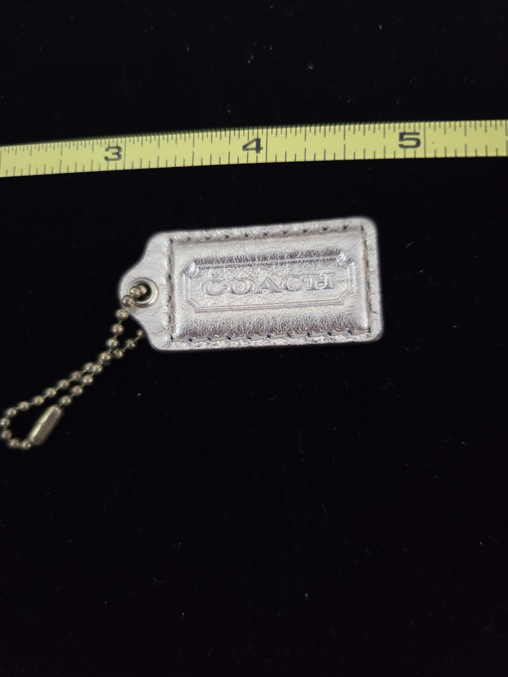 Coach Metallic Silver Leather Tag Keychain